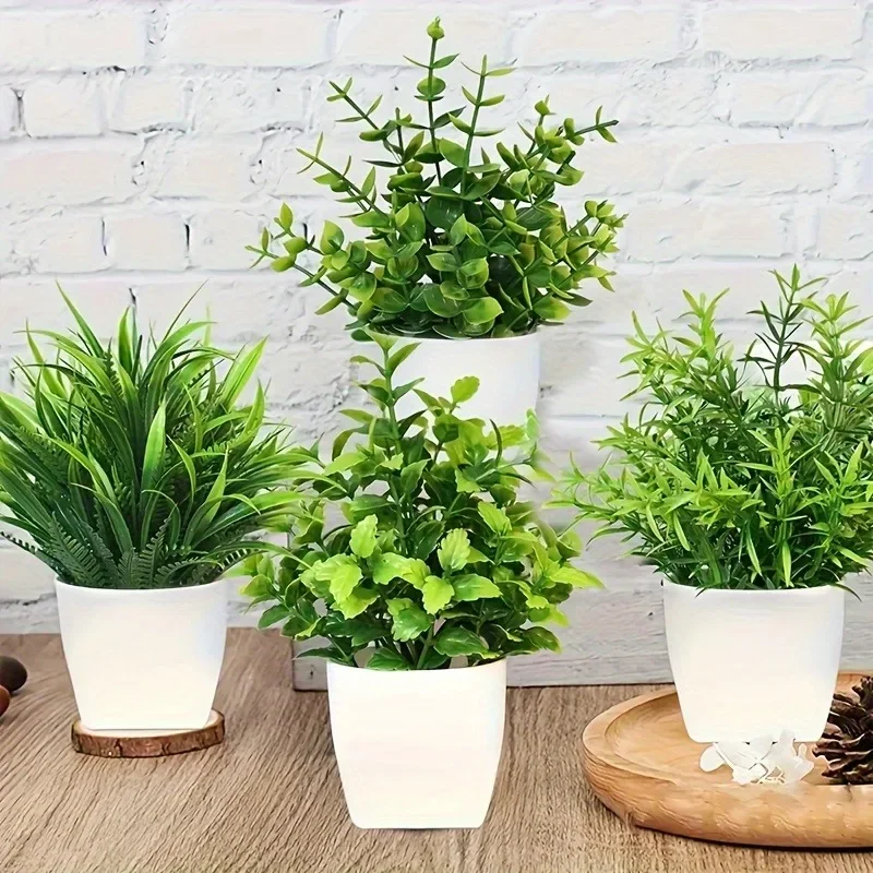 Venta al por mayor OEM/ODM Mini plantas artificiales en macetas Planta de eucalipto rociada falsa en macetas Plantas de casa para el hogar y la Oficina